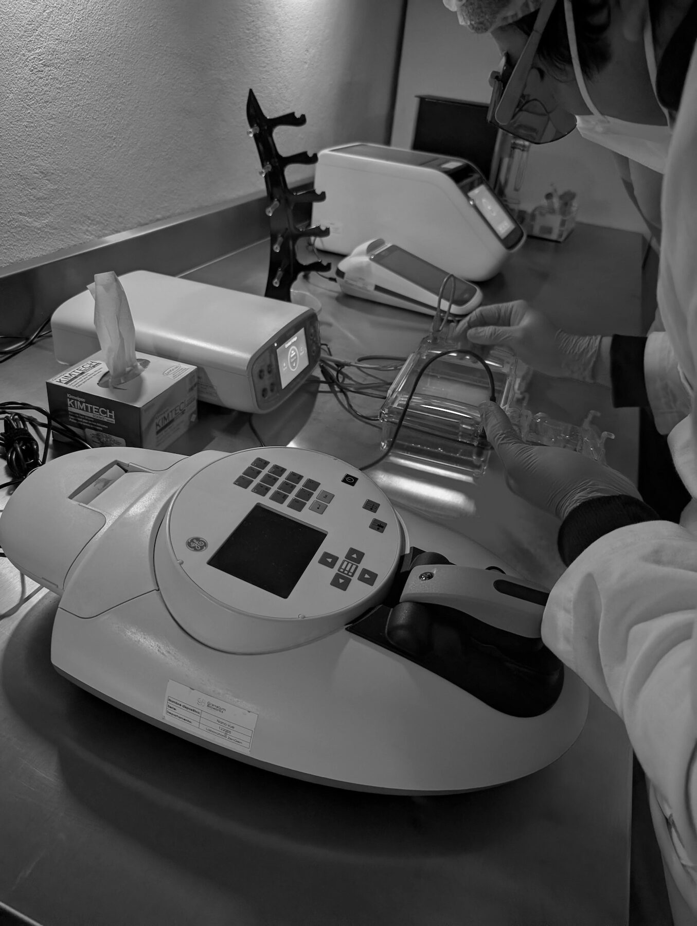 Genotyping instruments on the laboratory bench at Granatum.